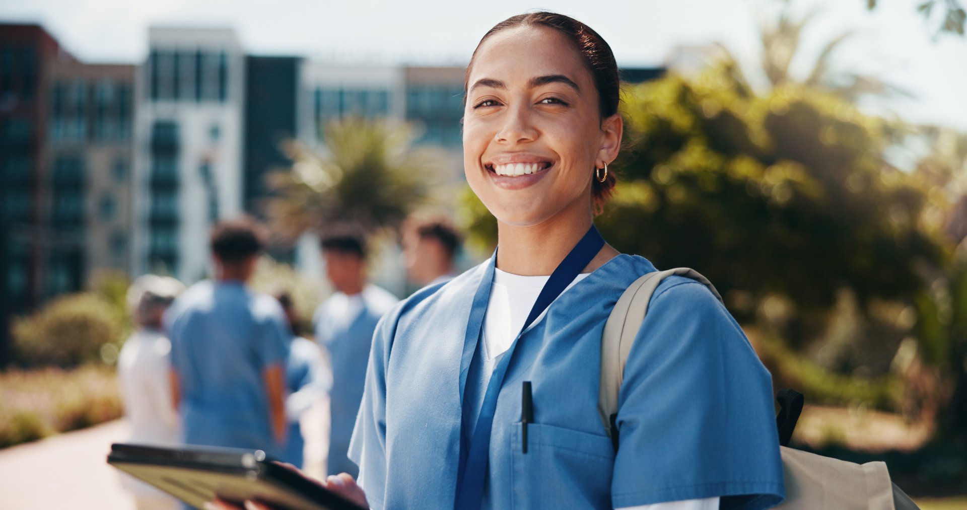 Nurse Outdoors Posing and Smiling