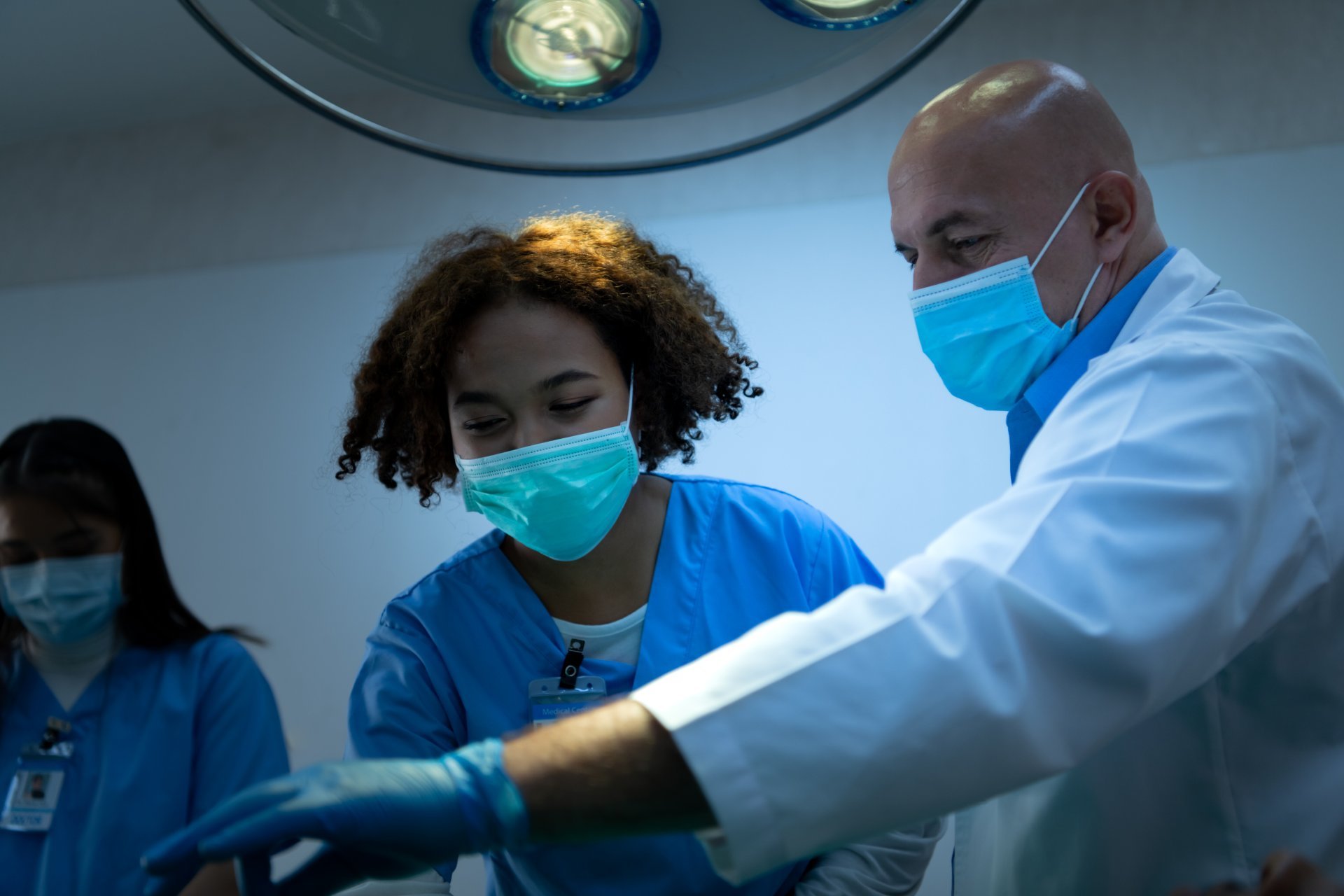 Doctor and technicians performing a procedure