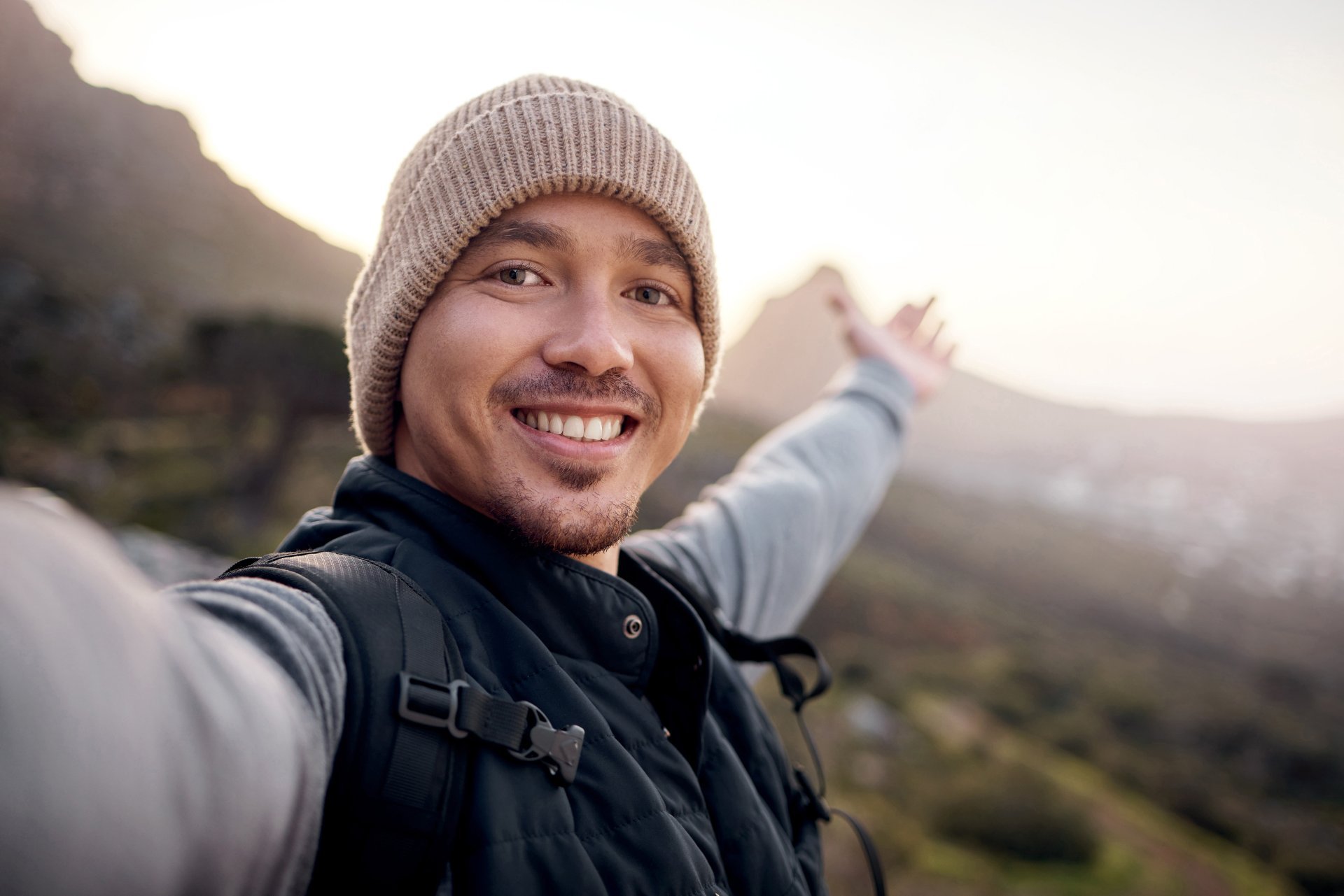 Selfie of a young man on a hike.