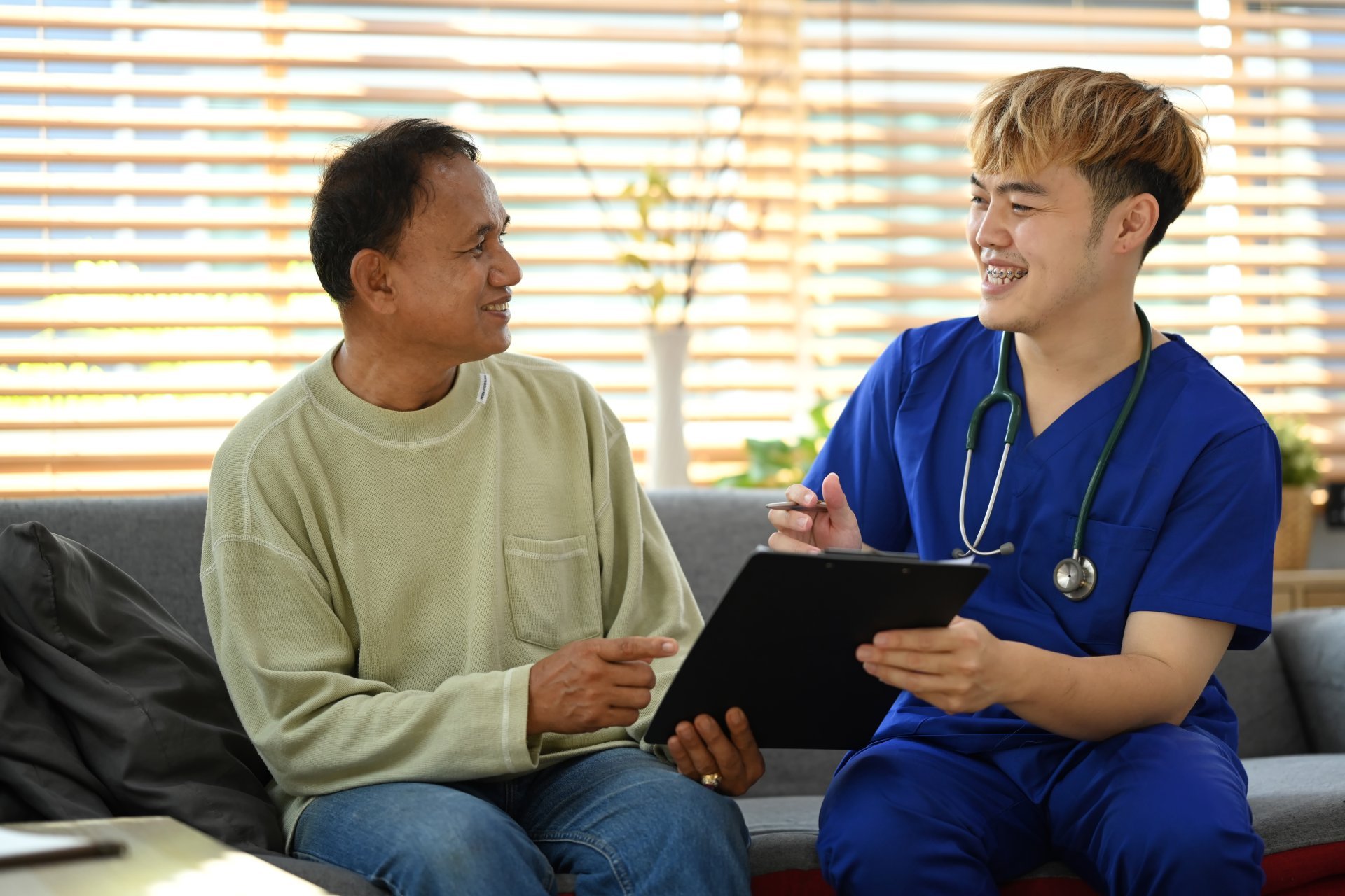 A clinician explains his patient's care plan.