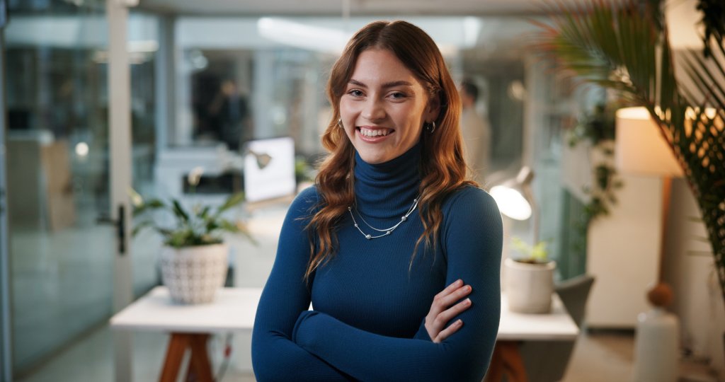 Person posing in an office