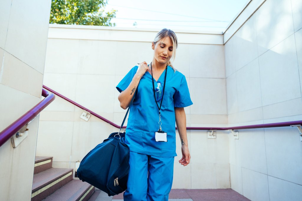 Nurse walking down steps