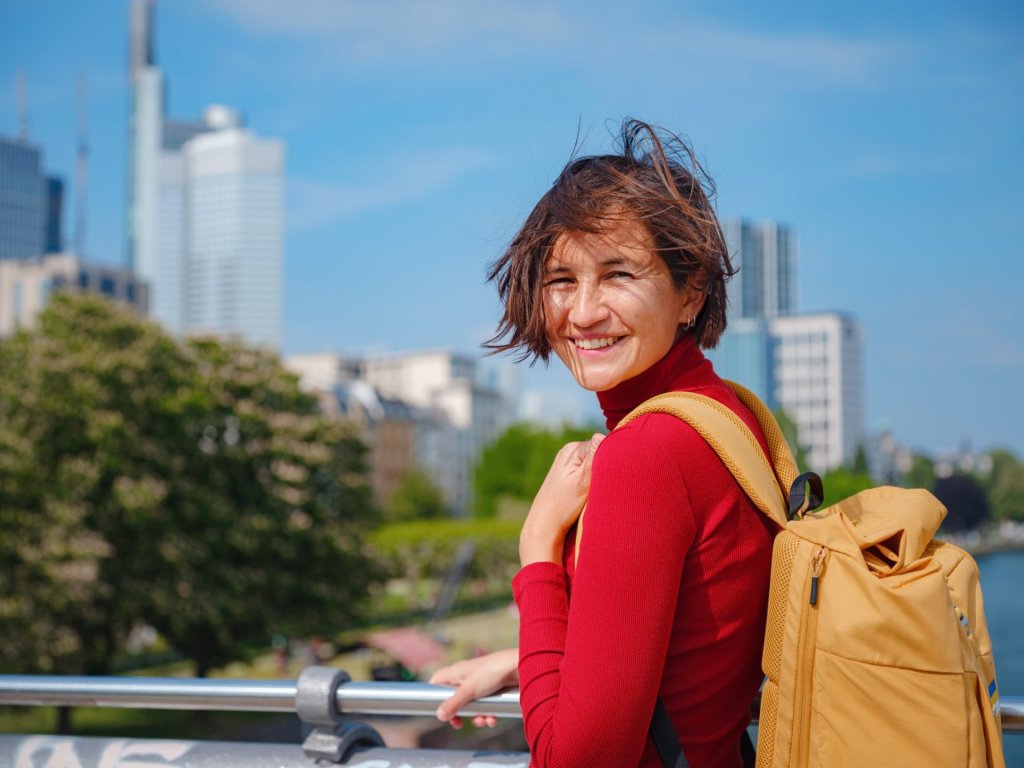 Smiling woman on solo trip