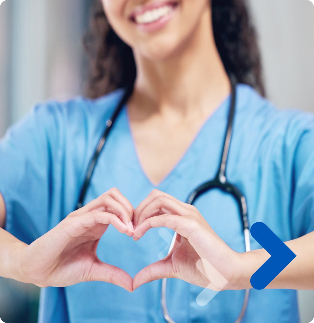 Nurse makes heart with her hands