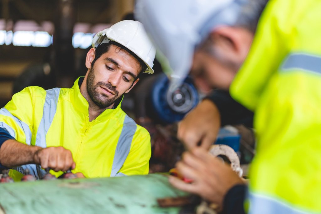 Professional engineering technician in safety gear at work